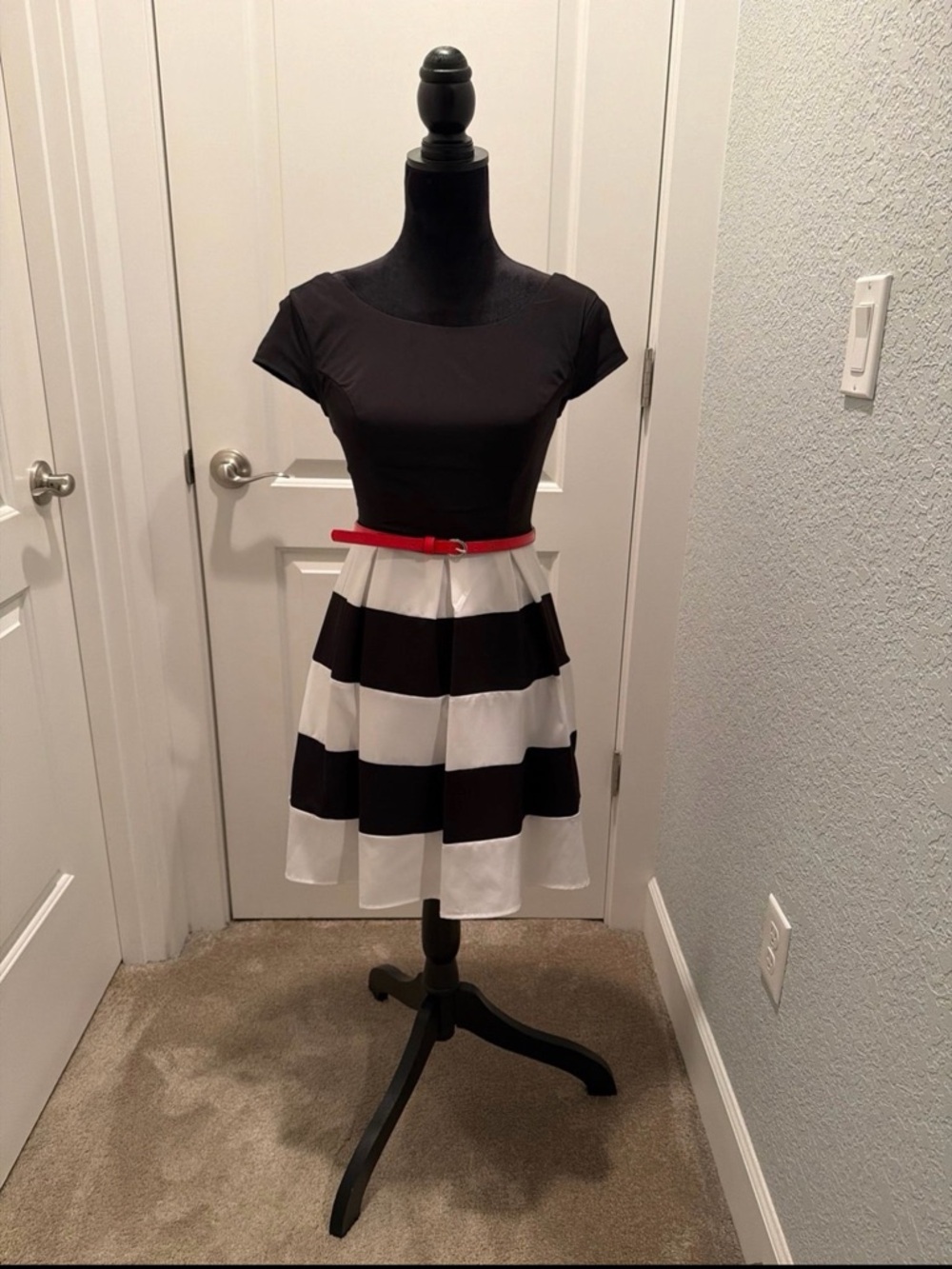 B Darlin Black Top with Black & White Striped Skater Skirt and Red Belt